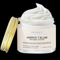 Creamy whipped grass-fed tallow balm with vanilla bean scent by Solikka, showing the smooth, pale balm texture in a jar.
