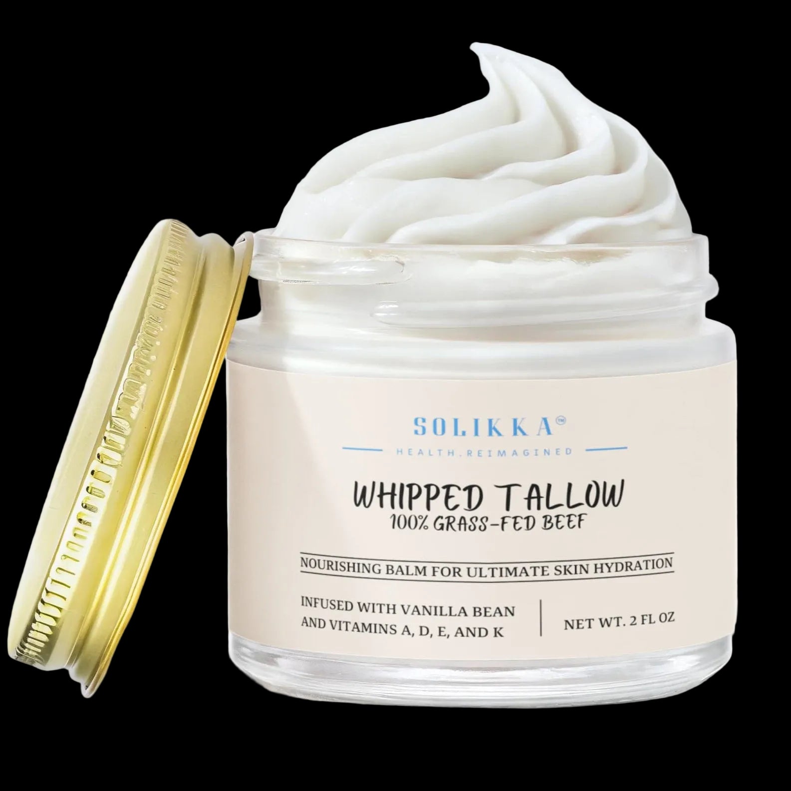 Creamy whipped grass-fed tallow balm with vanilla bean scent by Solikka, showing the smooth, pale balm texture in a jar.