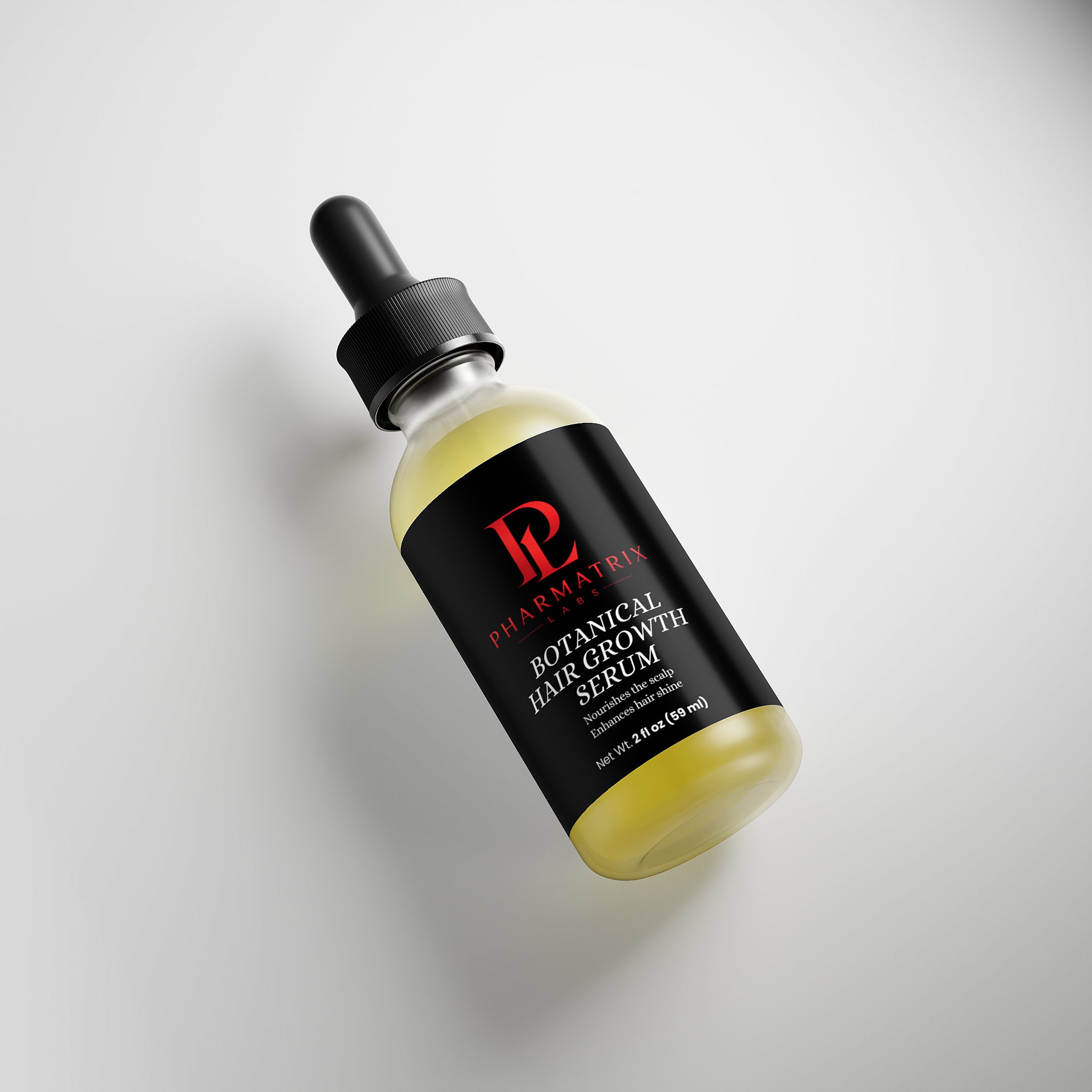 Bottle of botanical hair growth serum with dropper on a light gray background