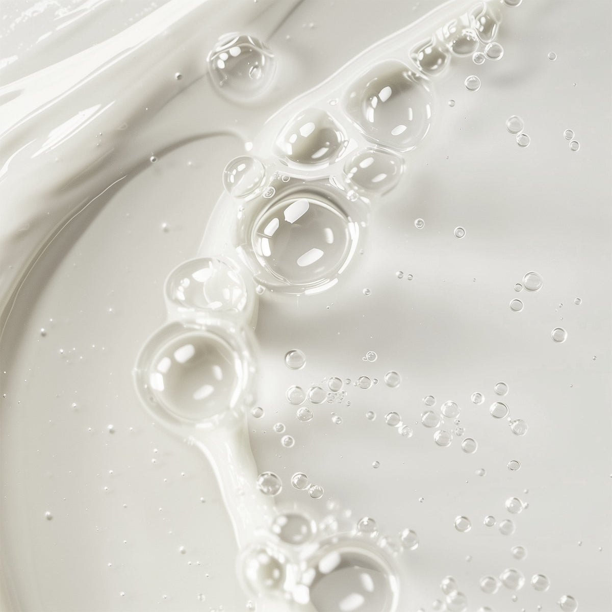 Close-up of toner with bubbles on a light gray background
