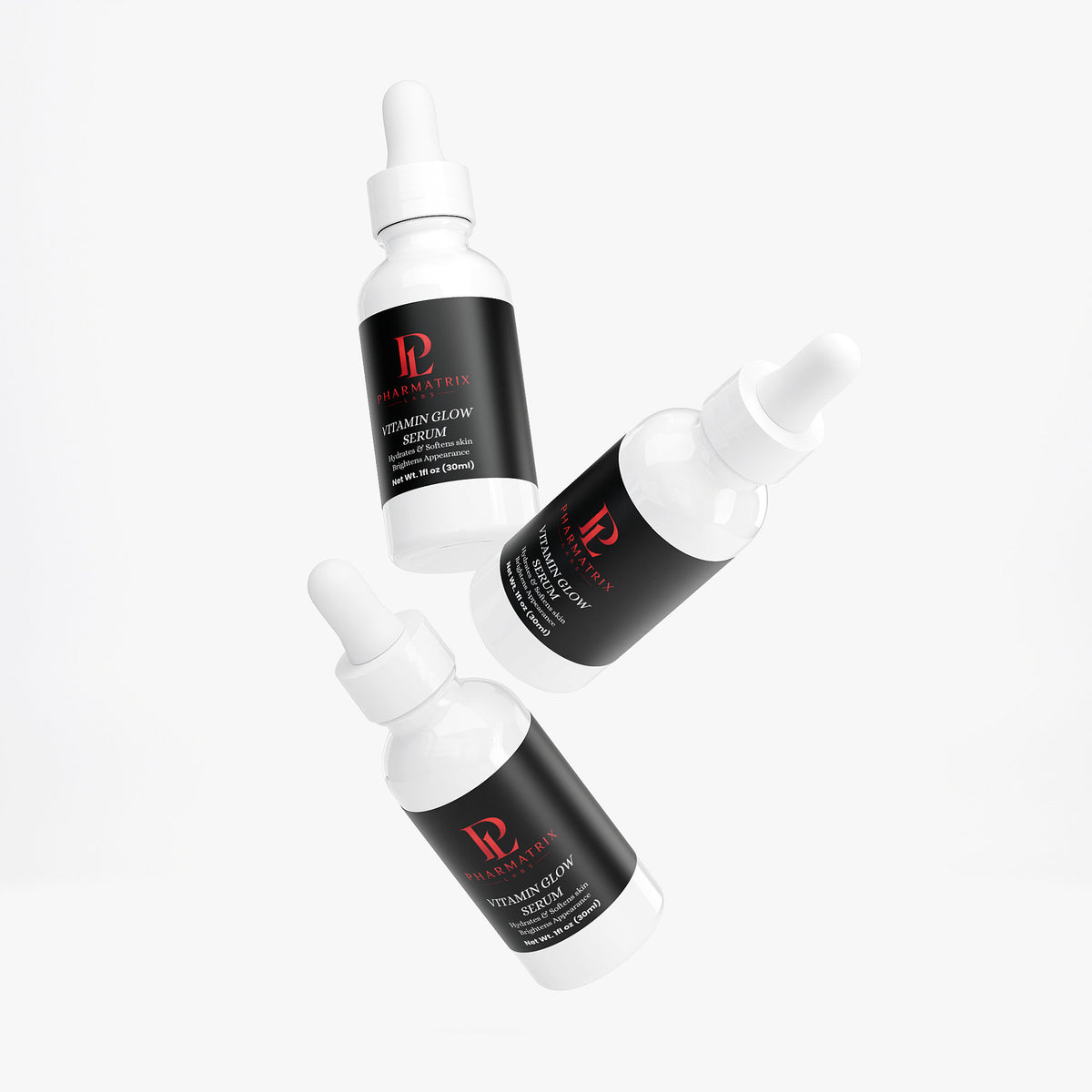 Three bottles of vitamin glow serum on a white background